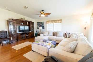 Welcome to your idyllic retreat at 1426 Whispering Pines Loop on Lily Lake Golf and RV Resort in Florida - for sale on GolfHomes.com, golf home, golf lot