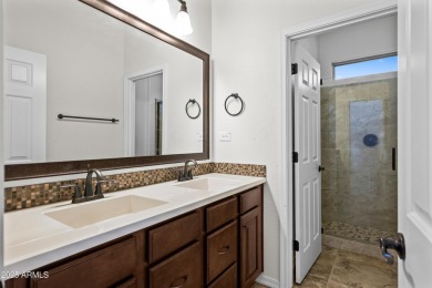 Charming ranch home features 4 bedrooms plus a den. Step inside on Wigwam Golf  Resort Litchfield Park  in Arizona - for sale on GolfHomes.com, golf home, golf lot
