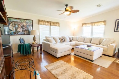 Welcome to your idyllic retreat at 1426 Whispering Pines Loop on Lily Lake Golf and RV Resort in Florida - for sale on GolfHomes.com, golf home, golf lot