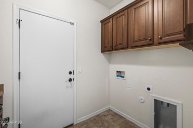 Charming ranch home features 4 bedrooms plus a den. Step inside on Wigwam Golf  Resort Litchfield Park  in Arizona - for sale on GolfHomes.com, golf home, golf lot