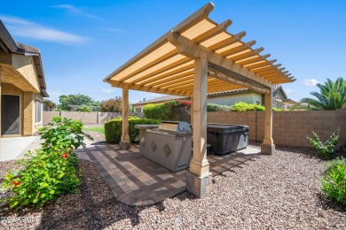 Charming ranch home features 4 bedrooms plus a den. Step inside on Wigwam Golf  Resort Litchfield Park  in Arizona - for sale on GolfHomes.com, golf home, golf lot