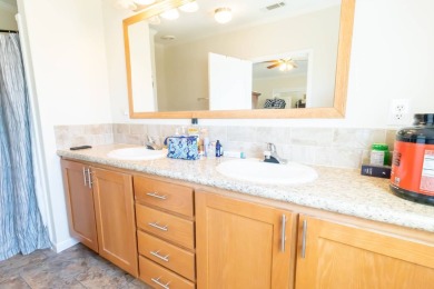 Welcome to your idyllic retreat at 1426 Whispering Pines Loop on Lily Lake Golf and RV Resort in Florida - for sale on GolfHomes.com, golf home, golf lot