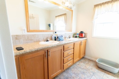 Welcome to your idyllic retreat at 1426 Whispering Pines Loop on Lily Lake Golf and RV Resort in Florida - for sale on GolfHomes.com, golf home, golf lot