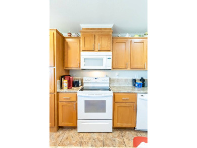 Welcome to your idyllic retreat at 1426 Whispering Pines Loop on Lily Lake Golf and RV Resort in Florida - for sale on GolfHomes.com, golf home, golf lot