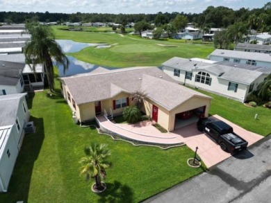 Welcome to your dream home! This 2,160+ sq ft masterpiece has on Hamptons Golf Club in Florida - for sale on GolfHomes.com, golf home, golf lot