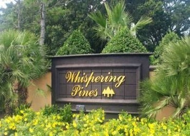 Welcome to your idyllic retreat at 1426 Whispering Pines Loop on Lily Lake Golf and RV Resort in Florida - for sale on GolfHomes.com, golf home, golf lot
