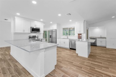 Under contract-accepting backup offers. Fully Renovated on Feather Sound Country Club in Florida - for sale on GolfHomes.com, golf home, golf lot