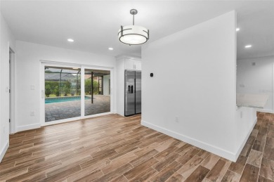 Under contract-accepting backup offers. Fully Renovated on Feather Sound Country Club in Florida - for sale on GolfHomes.com, golf home, golf lot