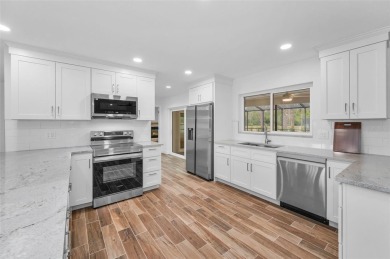 Under contract-accepting backup offers. Fully Renovated on Feather Sound Country Club in Florida - for sale on GolfHomes.com, golf home, golf lot