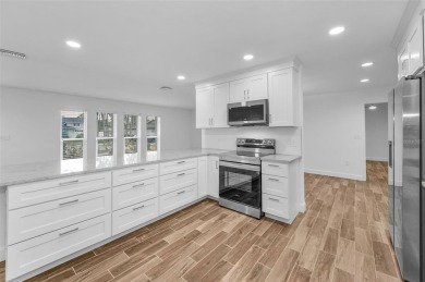 Under contract-accepting backup offers. Fully Renovated on Feather Sound Country Club in Florida - for sale on GolfHomes.com, golf home, golf lot