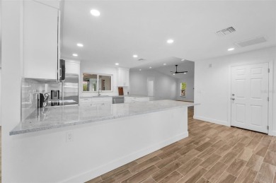 Under contract-accepting backup offers. Fully Renovated on Feather Sound Country Club in Florida - for sale on GolfHomes.com, golf home, golf lot
