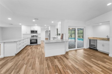 Under contract-accepting backup offers. Fully Renovated on Feather Sound Country Club in Florida - for sale on GolfHomes.com, golf home, golf lot