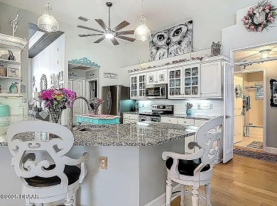 Welcome to this beautifully updated move-in ready pool home in on Plantation Bay Golf and Country Club in Florida - for sale on GolfHomes.com, golf home, golf lot