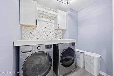 Beautifully updated Eagle Harbor home featuring a brand-new on Eagle Harbor Golf Club in Florida - for sale on GolfHomes.com, golf home, golf lot