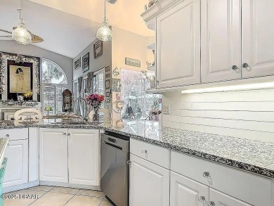 Welcome to this beautifully updated move-in ready pool home in on Plantation Bay Golf and Country Club in Florida - for sale on GolfHomes.com, golf home, golf lot