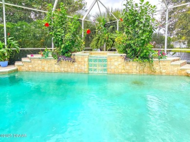 Welcome to this beautifully updated move-in ready pool home in on Plantation Bay Golf and Country Club in Florida - for sale on GolfHomes.com, golf home, golf lot