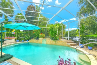 Welcome to this beautifully updated move-in ready pool home in on Plantation Bay Golf and Country Club in Florida - for sale on GolfHomes.com, golf home, golf lot