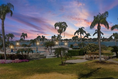 BAHIA VISTA'S BEST BUY! Enjoy beautiful water views from this on Isla Del Sol Yacht and Country Club in Florida - for sale on GolfHomes.com, golf home, golf lot