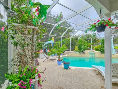 Welcome to this beautifully updated move-in ready pool home in on Plantation Bay Golf and Country Club in Florida - for sale on GolfHomes.com, golf home, golf lot