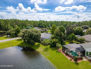 Welcome to this beautifully updated move-in ready pool home in on Plantation Bay Golf and Country Club in Florida - for sale on GolfHomes.com, golf home, golf lot