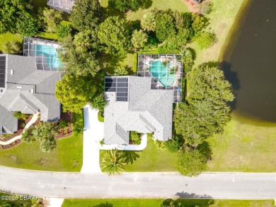 Welcome to this beautifully updated move-in ready pool home in on Plantation Bay Golf and Country Club in Florida - for sale on GolfHomes.com, golf home, golf lot