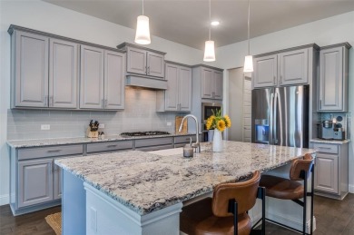 Welcome to your ideal one-story retreat in the prestigious on The Tribute At the Colony in Texas - for sale on GolfHomes.com, golf home, golf lot