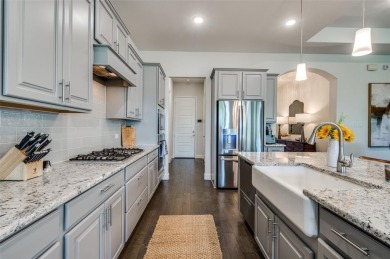 Welcome to your ideal one-story retreat in the prestigious on The Tribute At the Colony in Texas - for sale on GolfHomes.com, golf home, golf lot