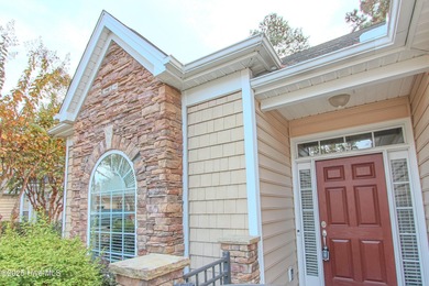 Welcome to your dream home in Cobblestone Village, nestled in on Sea Trail Golf Resort in North Carolina - for sale on GolfHomes.com, golf home, golf lot