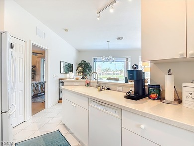 Welcome to this exceptional Ibis II POOL HOME in HERONS GLEN on Herons Glen Golf and Country Club in Florida - for sale on GolfHomes.com, golf home, golf lot