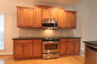 Welcome to your dream home in Cobblestone Village, nestled in on Sea Trail Golf Resort in North Carolina - for sale on GolfHomes.com, golf home, golf lot