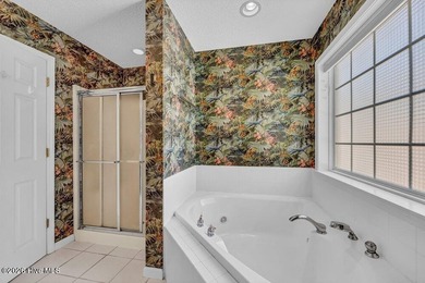 Beautiful brick 3-bedroom, 2-bath home located in the highly on Masonboro Country Club in North Carolina - for sale on GolfHomes.com, golf home, golf lot