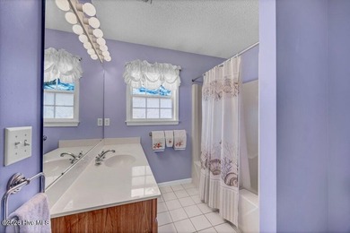 Beautiful brick 3-bedroom, 2-bath home located in the highly on Masonboro Country Club in North Carolina - for sale on GolfHomes.com, golf home, golf lot