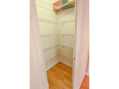 Welcome to your dream home in Cobblestone Village, nestled in on Sea Trail Golf Resort in North Carolina - for sale on GolfHomes.com, golf home, golf lot