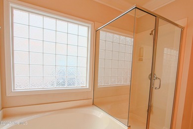 Welcome to your dream home in Cobblestone Village, nestled in on Sea Trail Golf Resort in North Carolina - for sale on GolfHomes.com, golf home, golf lot