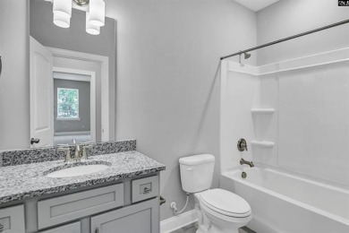 Stunning Craftsman Walk-out Basement Home with Golf Course Views on Woodside Plantation Country Club in South Carolina - for sale on GolfHomes.com, golf home, golf lot