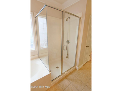 Welcome to your dream home in Cobblestone Village, nestled in on Sea Trail Golf Resort in North Carolina - for sale on GolfHomes.com, golf home, golf lot