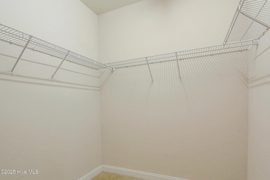 Welcome to your dream home in Cobblestone Village, nestled in on Sea Trail Golf Resort in North Carolina - for sale on GolfHomes.com, golf home, golf lot