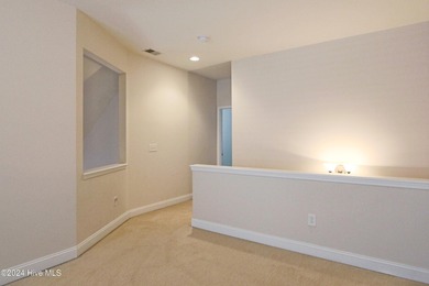 Welcome to your dream home in Cobblestone Village, nestled in on Sea Trail Golf Resort in North Carolina - for sale on GolfHomes.com, golf home, golf lot