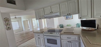 Seller is ready to sell. Newly renovated home on peaceful on Port Charlotte Golf Club in Florida - for sale on GolfHomes.com, golf home, golf lot