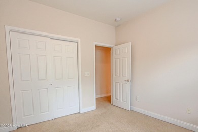 Welcome to your dream home in Cobblestone Village, nestled in on Sea Trail Golf Resort in North Carolina - for sale on GolfHomes.com, golf home, golf lot