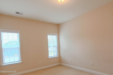 Welcome to your dream home in Cobblestone Village, nestled in on Sea Trail Golf Resort in North Carolina - for sale on GolfHomes.com, golf home, golf lot