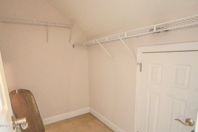 Welcome to your dream home in Cobblestone Village, nestled in on Sea Trail Golf Resort in North Carolina - for sale on GolfHomes.com, golf home, golf lot