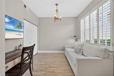 Beautifully updated first-floor coach home featuring luxury on Pelican Sound Golf and River Club in Florida - for sale on GolfHomes.com, golf home, golf lot