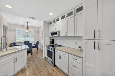 Beautifully updated first-floor coach home featuring luxury on Pelican Sound Golf and River Club in Florida - for sale on GolfHomes.com, golf home, golf lot