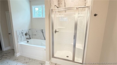 Autry Lake at Gates Four, Gated Community, 3 bedrooms 2.5 bath on Gates Four Golf and Country Club in North Carolina - for sale on GolfHomes.com, golf home, golf lot