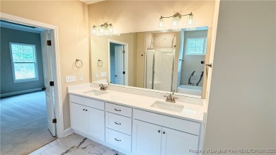 Autry Lake at Gates Four, Gated Community, 3 bedrooms 2.5 bath on Gates Four Golf and Country Club in North Carolina - for sale on GolfHomes.com, golf home, golf lot