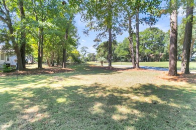 Escape to your serene golf course view in this on Charleston National Golf Club in South Carolina - for sale on GolfHomes.com, golf home, golf lot