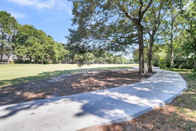 Escape to your serene golf course view in this on Charleston National Golf Club in South Carolina - for sale on GolfHomes.com, golf home, golf lot