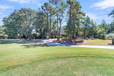 Escape to your serene golf course view in this on Charleston National Golf Club in South Carolina - for sale on GolfHomes.com, golf home, golf lot