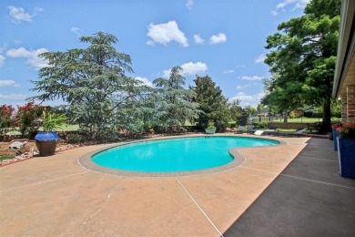 Take up this beautiful home located on the west side of Oak Tree on Oak Tree National Golf and Country Club in Oklahoma - for sale on GolfHomes.com, golf home, golf lot